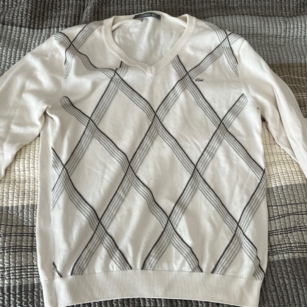 Lacoste v neck sweater . Beige w/ grey pattern. Size medium / 4